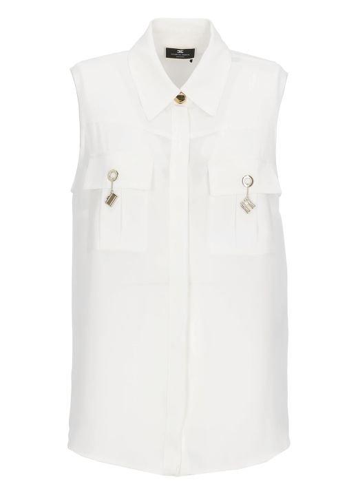 Sleeveless shirt with charms